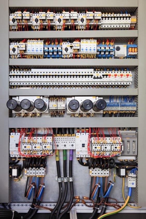 Wired cabinet with relays, transformers, and control units